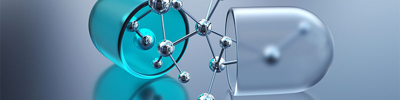 promo_two image is an artist’s rendering of a ball and stick chemical compound emerging from a split-open drug capsule